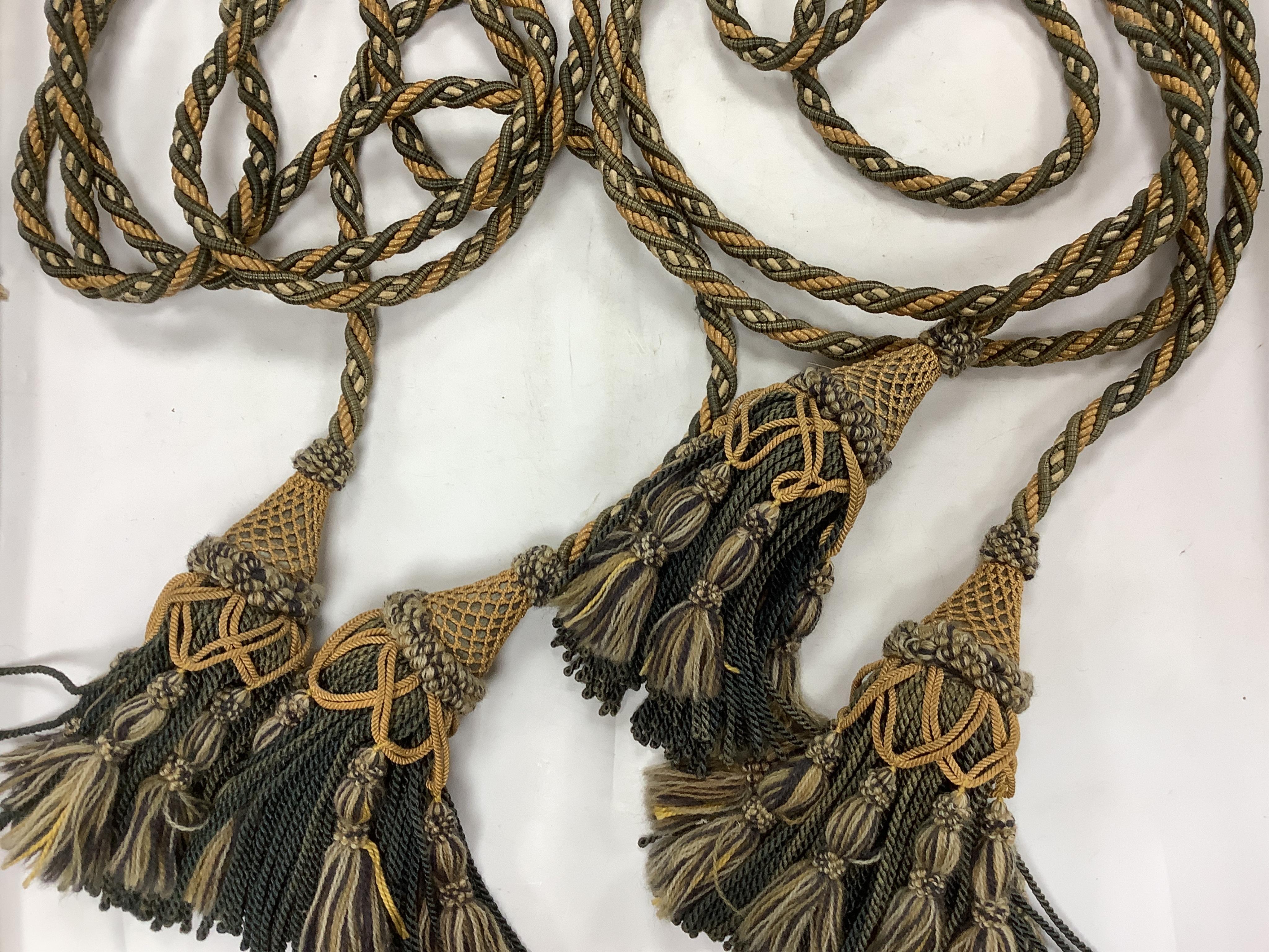 Two 20th century long corded, double tasselled silk and wool tie backs, 194cm each. Condition - some fading.